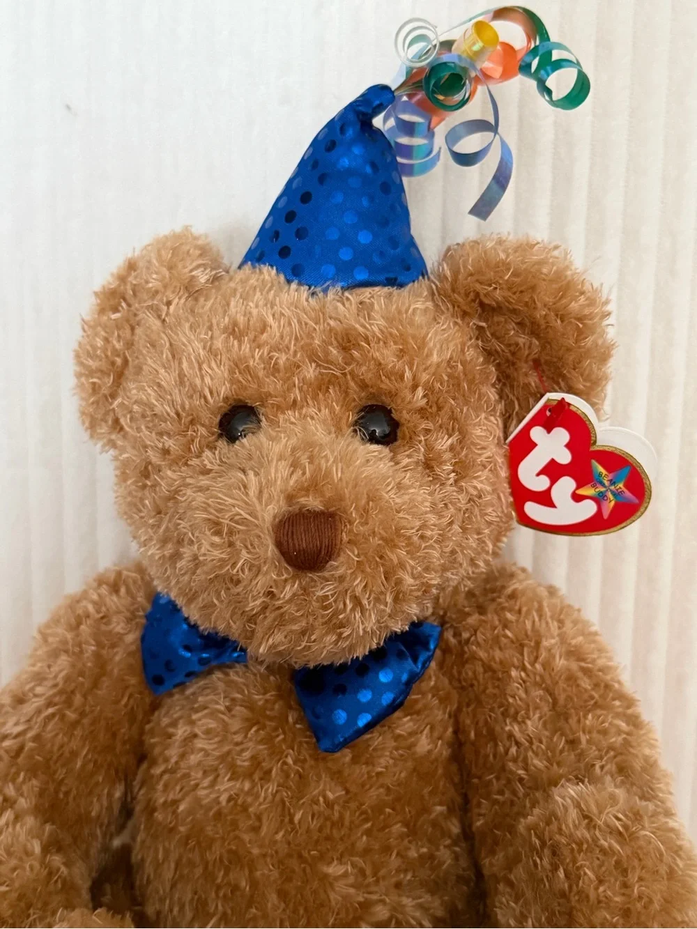 Kids plush toy with birthday hat